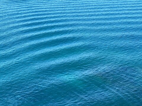 Blue sea water ripples surface. 