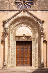 Fototapeta na wymiar The portal of the Basilica of Saint Catherine of Alexandria, Galatina, Lecce