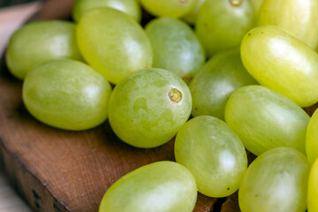 Green yellow grapes grown in a home vineyard