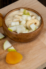 fresh yogurt made from milk with slices of fresh banana