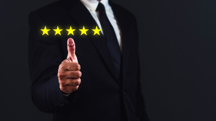 Customer satisfaction concept. Businessman show thumb up with positive emotion happy face and five stars.