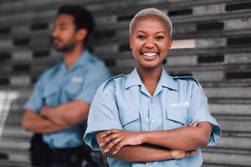 Portrait, security or law enforcement and a happy black woman arms crossed with a man colleague on...