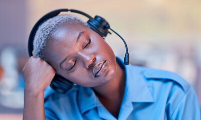 Tired, call center and black woman sleeping with headset during telemarketing work at night....