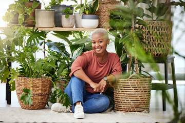 Black woman, plants in a basket and relax with nature, gardening and sustainability with environment. African female person, eco friendly and smile in portrait, happy with botany and green leaves