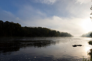 Obraz na płótnie Canvas Small fog on the river in autumn