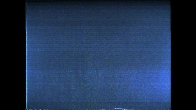 A television screen with VHS effect of digital pixelated noise, displaying a 4x3 image. Holomatrix damage. VHS digital pixelated noise effect.