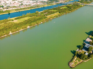 Aerial drone view of Danube river in Vienna Austria cityscape with danube island