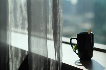 coffee cup with a window in the morning