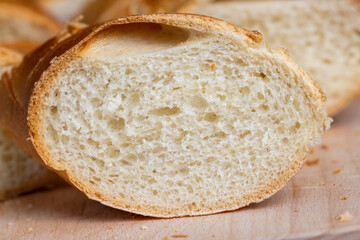 pieces of soft baguette on a cutting board