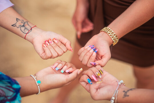 Group Of Friends With Painted Nails