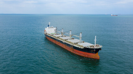 Self-unloading bulk carrier at Rio De La Plata anchorage. Aerial front view.