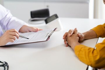 Healthcare. Doctor and patient are discussing interview consulting patient. Professional medical...