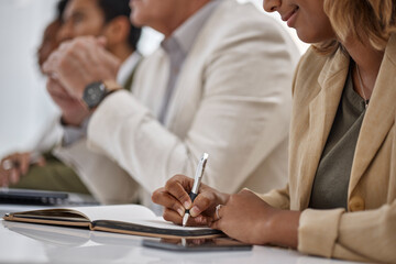 Woman, hands and writing in book for meeting notes, information or minutes on office desk in...