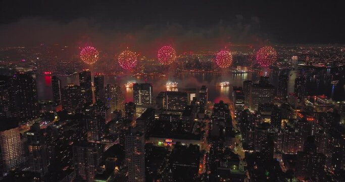 Breathtaking aerial video capturing the 4th of July fireworks celebration over the East River, with views of Manhattan, Queens, and Brooklyn.