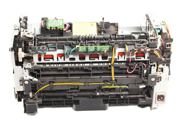Disassembled laser printer isolated on white background