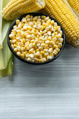 Corn on a black bowl, Top view of corn seeds