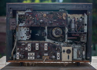 Fototapeta na wymiar Unearthing the Enigmatic Charms of an Antique Wooden Vintage Television