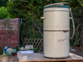 Naklejka premium Reviving the Time-Honored Splendor of an Antique Washing Machine