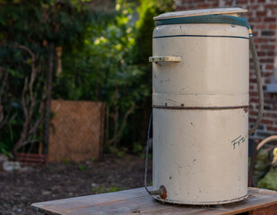 Obraz premium Reviving the Time-Honored Splendor of an Antique Washing Machine