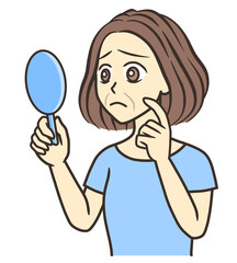 A woman looking at nasolabial folds in a hand mirror