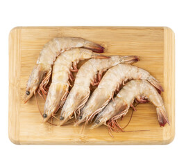 raw jumbo shrimp on a board