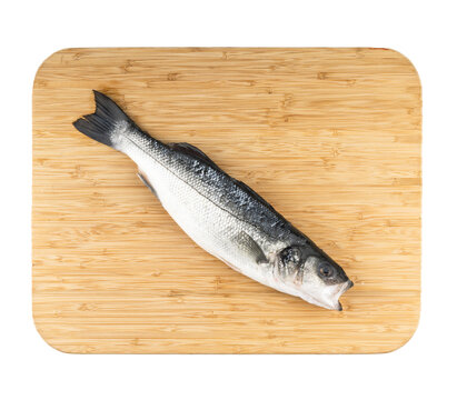 raw sea bass on a board