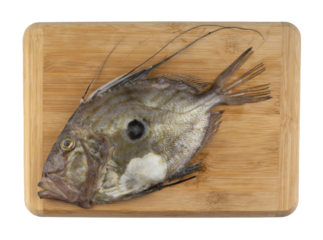saint peter's fish on a board