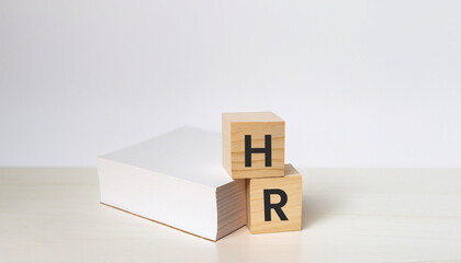 HR Wood cubes with background, copy space. Business, employment and human resources conceptual image