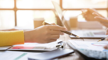 Financial analyst analyzes businessman investment consultant analyzing company financial report...