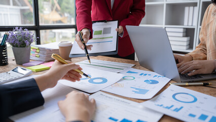 Meeting concept Business team hands at working with financial plan, meeting, discussion, brainstorm with tablet on the office desk,