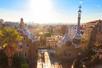 Fototapeta premium View of fairytale gingerbread houses in Park Guell designed by Antoni Gaudi in Barcelona, Spain