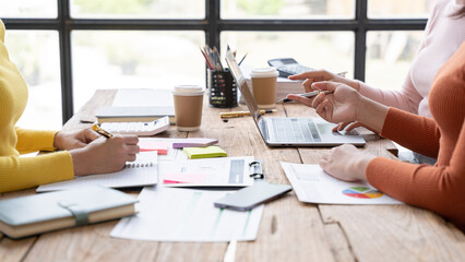 Business meeting.business team brainstorming while sitting at the office table together