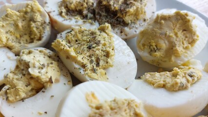 Homemade boiled eggs filled with cream, delicious meal close up