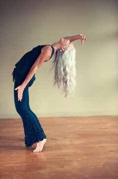 Mindful movement senior woman. 
