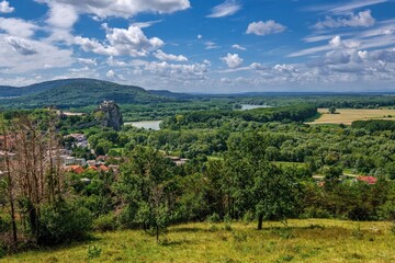 Obraz premium Stunning view from Devinska Kobyla. Ruins of castle Devin near Bratislava from the rocks to Devinska Kobyla. Danube river, floodplain forests and fields. Slovakia, Austria. 