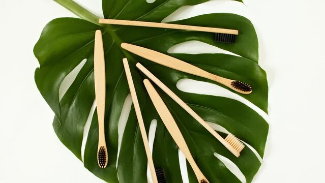 Eco-friendly biodegradable Bamboo toothbrush. No plastic. Conscious minimalism Vegan lifestyle. Reuse reduction concept. High quality 4k footage