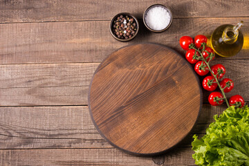 Obraz na płótnie Canvas Wooden board food background. Ingredients for cooking on table. Banner. Layout.