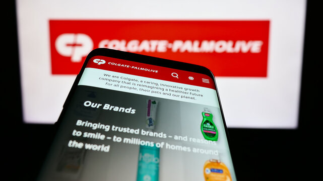 Stuttgart, Germany - 06-25-2023: Mobile phone with webpage of consumer goods business Colgate-Palmolive Company on screen in front of logo. Focus on top-left of phone display.