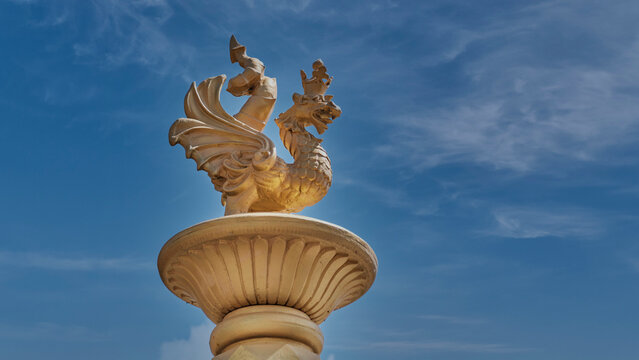 Golden figurine of zilant, decoration on gate of Millennium Park, Kazan, Russia.