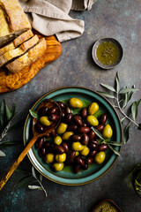 Olives and olive oil, top view