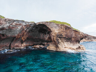 Cueva del indio coast landscape with rock arc shape formation at daylight from arecibo puerto rico