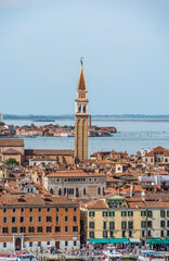 Fototapeta na wymiar Aerial view with the medieval bell tower of the franciscan church Chiesa di San Francesco della Vigna, in Venice Italy.
