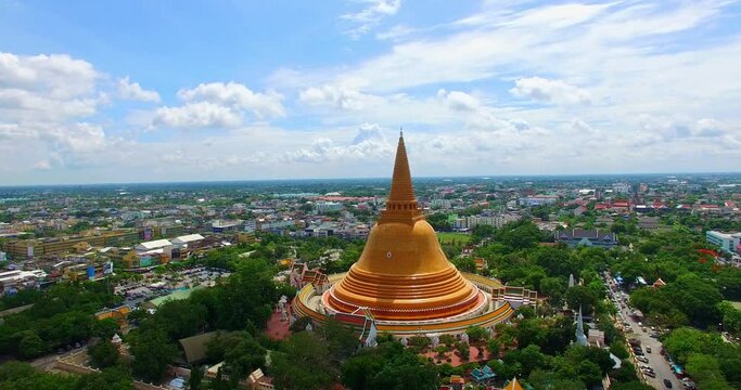 .aerial view amazing big yellow stupa in the central of Nakhon Pathom province. .Phra Pathom Chedi is the great yellow pagoda it is the tallest stupa in the world. .wonderful architect golden pagoda.