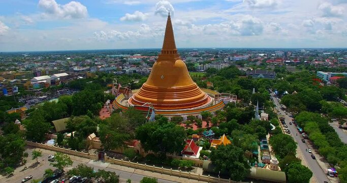.aerial view amazing big yellow stupa in the central of Nakhon Pathom province. .Phra Pathom Chedi is the great yellow pagoda it is the tallest stupa in the world. .wonderful architect golden pagoda.