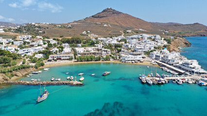 Aerial drone photo of small port and beach of Piso livadi in island of Paros, Cyclades, Greece