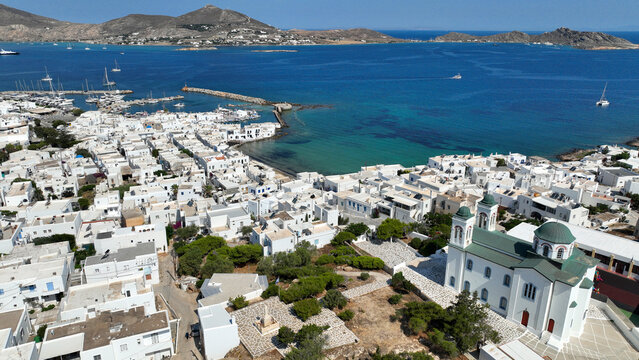 Aerial drone photo of picturesque small seaside village of Naoussa with traditional Cycladic character, Paros island, Cyclades, Greece