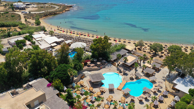 Aerial drone photo of famous organised beach of Punda with crystal clear turquoise sea, Paros island, Cyclades, Greece