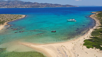Aerial drone photo of azure paradise blue lagoon of Panteronisi a small islet complex between Paros...