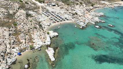 Aerial drone photo of famous small organised beach with unique rock formations of Kolimbithres or...
