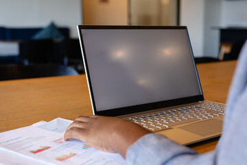 Hands of plus size african american casual businesswoman using laptop, copy space in office